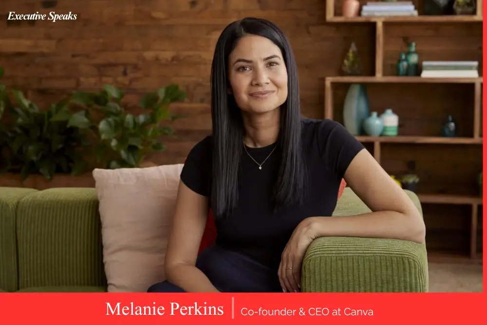 Melanie Perkins, co-founder and CEO of Canva, smiling at a Canva-branded event