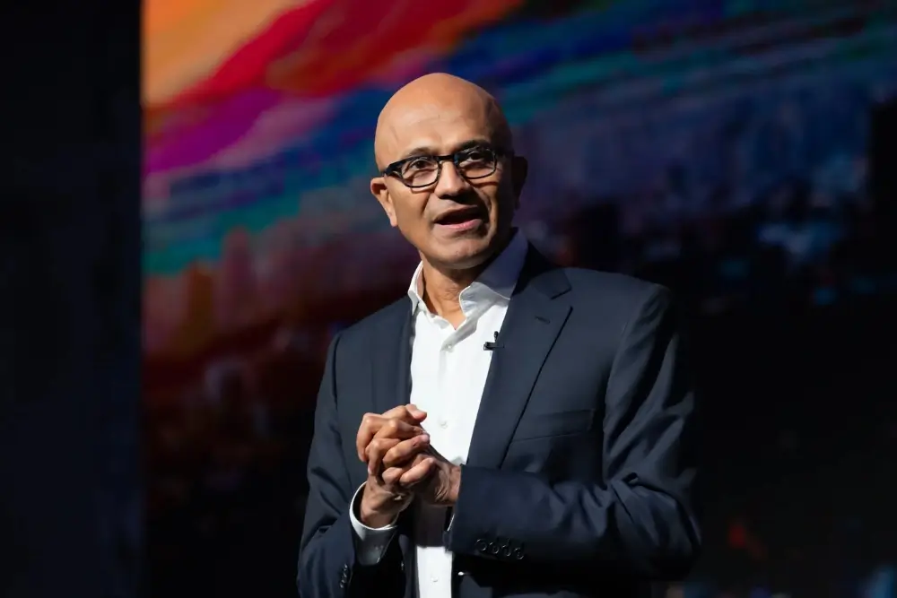 Satya Nadella speaking at a Microsoft event illustrating modern leadership qualities
